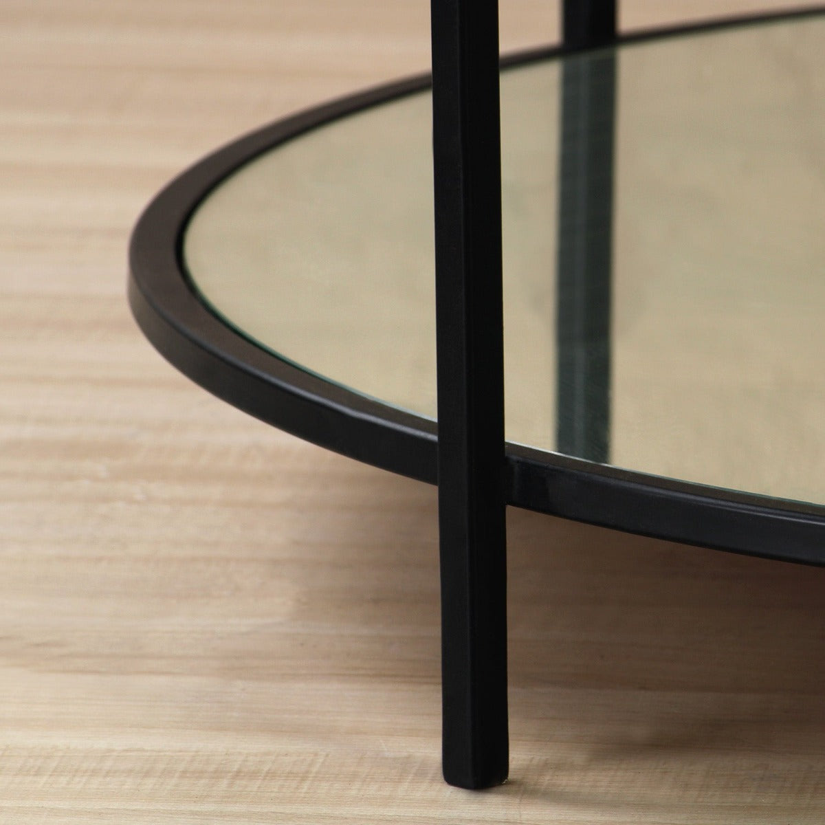Osby Glass Round Coffee Table In Black Finish